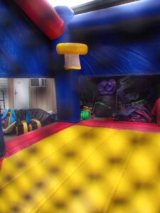 Super hero bounce house combo basketball goal