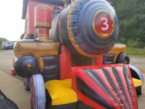 Magic City Express Train bounce house combo close-up