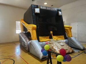 Skid Loader Bounce House Pick Up Your Party